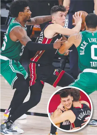  ?? Pictures: GETTY IMAGES ?? Miami’s Tyler Herro looks to pass against Boston opponents Jayson Tatum and Marcus Smart on Thursday and (inset) celebrates the win.