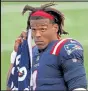  ?? Matt Stone / Boston Herald ?? Patriots quarterbac­k Cam Newton did not practice Saturday as the team returned to its facility, and his status for Monday’s game against the Broncos remains uncertain.