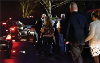  ?? HYOSUB SHIN PHOTOS / HSHIN@AJC.COM ?? Community members packed the visitation for Henry County police Officer Michael Smith at Cannon Cleveland Funeral Home in McDonough on Wednesday. Smith died Friday at Piedmont Atlanta Hospital from a gunshot wound he sustained Dec. 6, police said. He was 33.