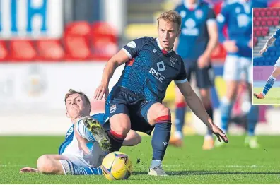  ??  ?? St Johnstone’s Liam Craig, left, challenges Ross County’s Harry Paton