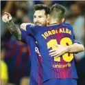  ?? The Associated Press ?? Barcelona’s Lionel Messi celebrates after scoring Tuesday during a 3-0 win over Juventus in Barcelona, Spain.