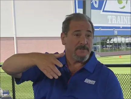  ?? TOM CANAVAN — THE ASSOCIATED PRESS ?? Giants General Manager Dave Gettleman speaks to the media at the team’s training camp in in East Rutherford, N.J., on Friday.