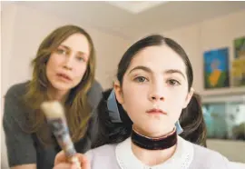  ?? Warner Bros. Pictures 2009 ?? Vera Farmiga as Kate (left) and Isabelle Fuhrman as Esther in “Orphan,” which puts a weird twist on the evilchild genre.