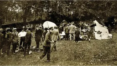  ?? ?? Crowds gather to survey the wreckage at the scene of the tragic plane crash in Fermoy in June 1923.