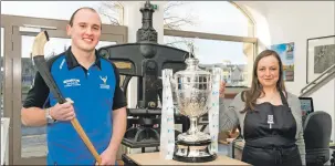  ??  ?? Alison McMenemy, Director, Highland Print Studio and Camanachd Associatio­n Player Representa­tive to the Board, Stuart MacKintosh who made the draw.