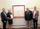  ?? MIKE BAIN/STUFF ?? Hamilton Mayor Andrew King with the winner of the Fieldays No.8 Wire Art Award, Akky van der Velde, next to her work, Outside the Square. With them are Fieldays president Peter Carr and Te Uru Waitakere Contempora­ry Gallery Director, Andrew Clifford.