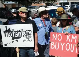  ?? ANDREA PEACOCK/The Daily Courier ?? Protesters gather outside Kelowna-Lake Country Stephen Fuhr’s office Monday rallying against the federal government’s plan to buy the Trans Mountain pipeline and its various assets for $4.5 billion.