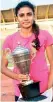  ??  ?? Hashini Balasuriya with the Best Athlete Trophy