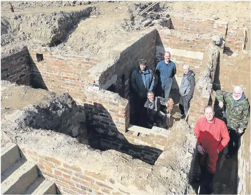  ??  ?? DELVING INTO PAST: The Salvage and Recovery Dowsing Team who discovered the WWII bunker on the Orkney farm of Swartland