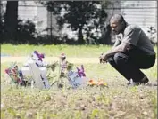  ?? Chuck Burton Associated Press ?? TERENCE WRIGHT at the spot where Walter L. Scott was killed in North Charleston. Police “look for any reason to stop black people,” one resident said.