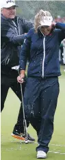  ?? VAUGHN RIDLEY/GETTY IMAGES ?? Brooke Henderson is doused in champagne by dad Dave after winning the CP Women’s Open Sunday in Regina.