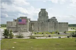  ??  ?? BELOW The US flag hangs proudly on the P Reactor at Savannah River Site, used to detect the neutrino in 1956, one of the most significan­t experiment­s in modern physics