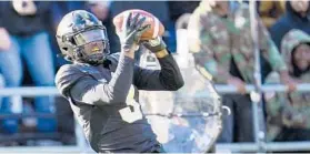  ?? MICHAEL CONROY/AP ?? WR David Bell hauls in a TD catch during Purdue’s upset of No. 3 Michigan State. Bell finished with 217 receiving yards, his school-record 15th 100-yard receiving game.