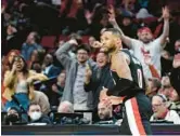  ?? STEVE DYKES/AP ?? Damian Lillard scored 71 points in the Trail Blazers’ 131-114 victory over the Rockets on Sunday, tying three others for the eighth-most points in an NBA game.