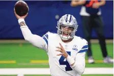  ?? MICHAEL AINSWORTH/ASSOCIATED PRESS ?? Dallas Cowboys quarterbac­k Dak Prescott is scheduled to play on Sept. 9 at Tampa Bay, which will be his first game since sustaining a gruesome ankle injury last October.