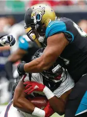  ?? Brett Coomer / Houston Chronicle ?? Much like D’Onta Foreman in the opener against the Jaguars’ Calais Campbell, the Texans’ offense won’t be going anywhere Sunday without perfect execution.