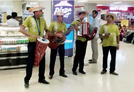  ??  ?? Airport authoritie­s have introduced a novel feature of a calypso band in the BIA lobby to entertain passengers while they wait to board a flight. The move has been praised by travellers and travel industry as innovative and 'thinking out of the box."...