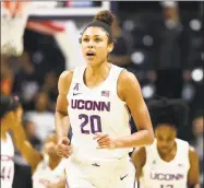  ?? Stephen Dunn / Associated Press ?? UConn’s Olivia NelsonOdod­a (20) heads up court during the second half of UConn’s win over California on Sunday in Storrs.