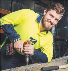  ??  ?? CONQUERING HURDLES: Apprentice Aaron Scarce has dyslexia and found an organisati­on to employ him.