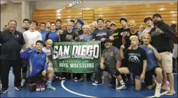  ??  ?? The Brawley Union High wrestling team smiles for a photo after winning the CIF-SDS Div. III title this year. The team also picked up All-Academic honors this season. COURTESY PHOTO