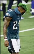  ?? MICHAEL AINSWORTH — THE ASSOCIATED PRESS ?? Eagles safety Jalen Mills walks off the field after their 37-17 loss to the Dallas Cowboys on Sunday that eliminated the team from NFC East contention.