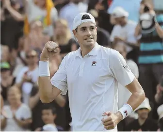  ?? AP PHOTO ?? PUMPED: John Isner celebrates after beating Stefanos Tsitsipas yesterday at Wimbledon to advance to the quarterfin­als for the first time.