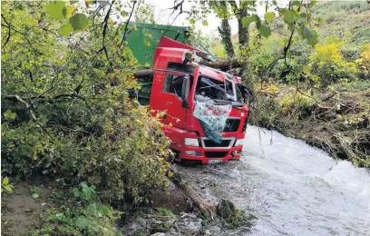  ?? Picture: Adrian White ?? The landslide which occurred during Storm Callum in 2018 also swept a lorry into the nearby river.