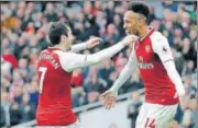  ?? AP ?? Henrikh Mkhitaryan (left) and Pierreemer­ick Aubameyang scored one goal and assisted another in Arsenal’s win over Watford.