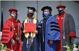  ?? PHOTO BY DAVID DEBALKO ?? Abigail Brand, 15, of Gilbertsvi­lle, served as the student commenceme­nt speaker. From left: Dr. Victoria L. Bastecki-Perez, MCCC President; Abigail Brand; Dr. Gloria Oikelome, MCCC Vice President for Academic Affairs and Frank X. Custer, Chair, MCCC Board of Trustees.