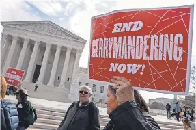  ?? SHAWN THEW/EPA-EFE ?? Protesters demonstrat­e outside the Supreme Court last March when the justices last considered partisan gerrymande­ring.