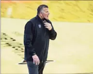  ?? John Peterson / Associated Press ?? Creighton head coach Greg McDermott instructs one of his players during a game against Marquette.