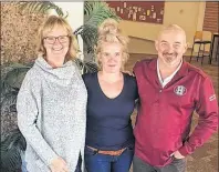  ??  ?? Amy Smits, centre, meets with Tracy and Jamie Hill after Smits was selected as the first recipient of the Hill Family Entrance Award.