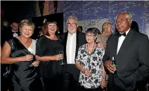  ?? SANDRA MU/GETTY IMAGES ?? Raelene Castle, second from left, with Phil Gifford at the 2012 NZ Rugby Awards in Auckland.