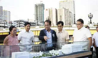  ?? PHOTOS COURTESY OF DHSUD ?? President Marcos vowed that the rehabilita­tion of the 25-kilometer stretch of Pasig River, spearheade­d by the Inter-Agency Council for the Pasig River Urban Developmen­t chaired by DHSUD Secretary Jose Rizalino Acuzar, will be "people centered."