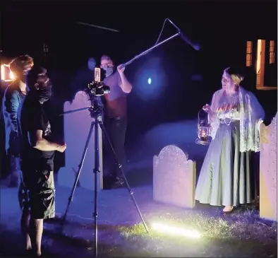  ?? / ?? Actress, Christina Van De Water of New Milford, does a sound check for the crew during the filming of the Norwalk Historical Society’s “A Haunting at Mill Hill – The Movie” in Norwalk. The movie will replace the historical society’s regular Haunting at Mill Hill fundraiser since COVID-19 prevented safe in-person events.