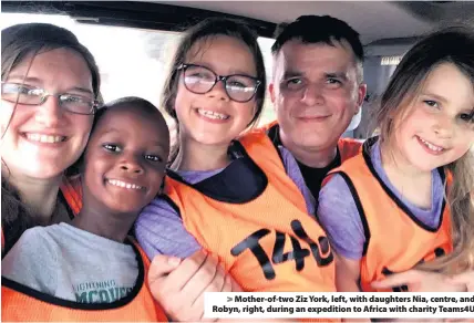  ??  ?? > Mother-of-two Ziz York, left, with daughters Nia, centre, and Robyn, right, during an expedition to Africa with charity Teams4U