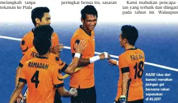  ??  ?? RAZIE (dua dari kanan) meraikan jaringan gol bersama rakan sepasukan di KL2017.