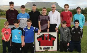  ??  ?? Seamas with his former Benbulben FC teammates and coaches in Grange.