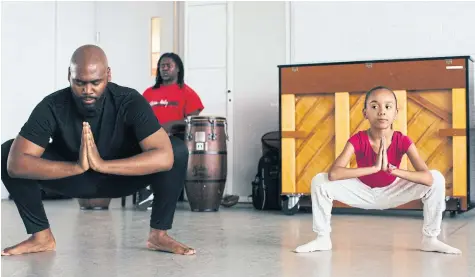  ??  ?? An Afro Flow Yoga class at the Ailey School in New York, on March 25.