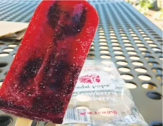  ?? SEAN LAUGHLIN/NORTHWEST ARKANSAS DEMOCRAT-GAZETTE ?? Delicious Pedal Pops can be found at High South on a Roll. They are locally made fruit popsicles that come in many different flavors