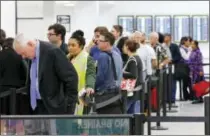  ?? AP FILE PHOTO/WILFREDO LEE ?? Air travelers can expect lines like this one, AAA Mid-Atlantic says in its annual Thanksgivi­ng holiday travel report.