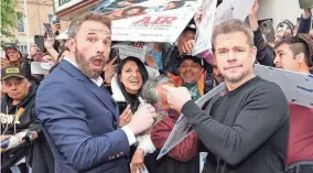  ?? GARY MILLER/WIREIMAGE ?? Close friendship­s between men can and do exist. Look no further than best friends Ben Affleck, left, and his bestie, Matt Damon.