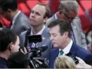  ?? AP FILE ?? Paul Manafort is surrounded by reporters on the floor of the Republican National Convention in Cleveland in July 2016.