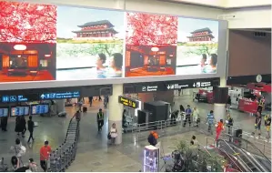  ?? BOONSONG KOSITCHOTE­THANA ?? An advertisin­g board at Don Mueang airport. The One Plus Co, recently acquired by Plan B Media Plc, manages 142 LCD screens in the arrivals and immigratio­n halls of six major Thai airports.