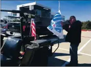  ?? JULIA PRODIS SULEK — STAFF ?? Tim Bero, 58, who left California and Oregon to move to a Fort Worth suburb years ago, drives his Texas convertibl­e, a 1962 U.s.army Jeep outfitted with a fake machine gun and Trump flags around town on Friday in Fort Worth, Texas.