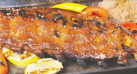  ?? PHOTOS: ATCO BLUE FLAME KITCHEN ?? Wild Rose Country Ribs begin with a sweet-and-savoury rub that's seasoned with paprika and dry mustard.