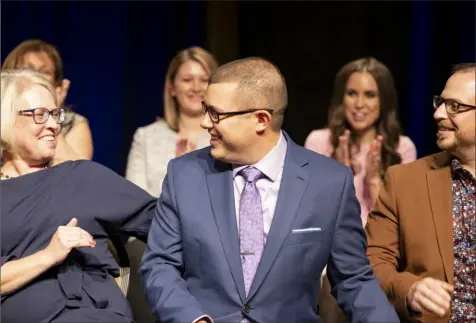  ?? Commonweal­th Media Services ?? Ryan D. Hardesty, center, of the Blackhawk School District, is the 2023 Pennsylvan­ia Teacher of the Year.