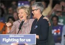  ??  ?? Democratic presidenti­al candidate Hillary Clinton and actress Jamie Lee Curtis speak Wednesday in Buena Park, Calif., at an event at the UFCW Union Local 324.