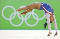  ??  ?? At 21, Simone Biles has taken more ownership of her routines. The weight of expectatio­ns she carried during the buildup to Rio de Janeiro is gone.