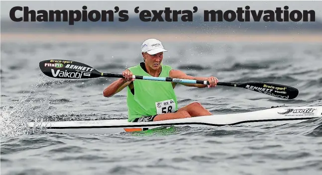  ??  ?? Danielle McKenzie paddles to victory in the canoe ocean racing world championsh­ips in France, a win which followed the death of her grandfathe­r.